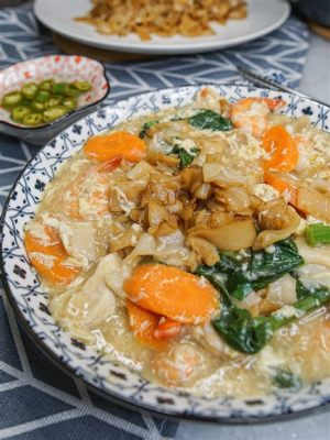  Fú-Dì ¿Sabias que este plato fujianés se prepara con un caldo cremoso de mariscos y verduras al estilo wok hei?